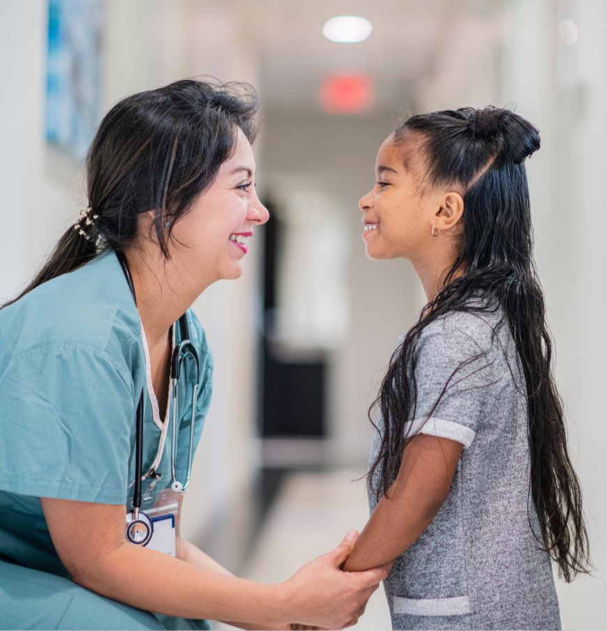 Women Doctor Talking to Child